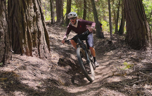 mountain biker riding singletrack trail