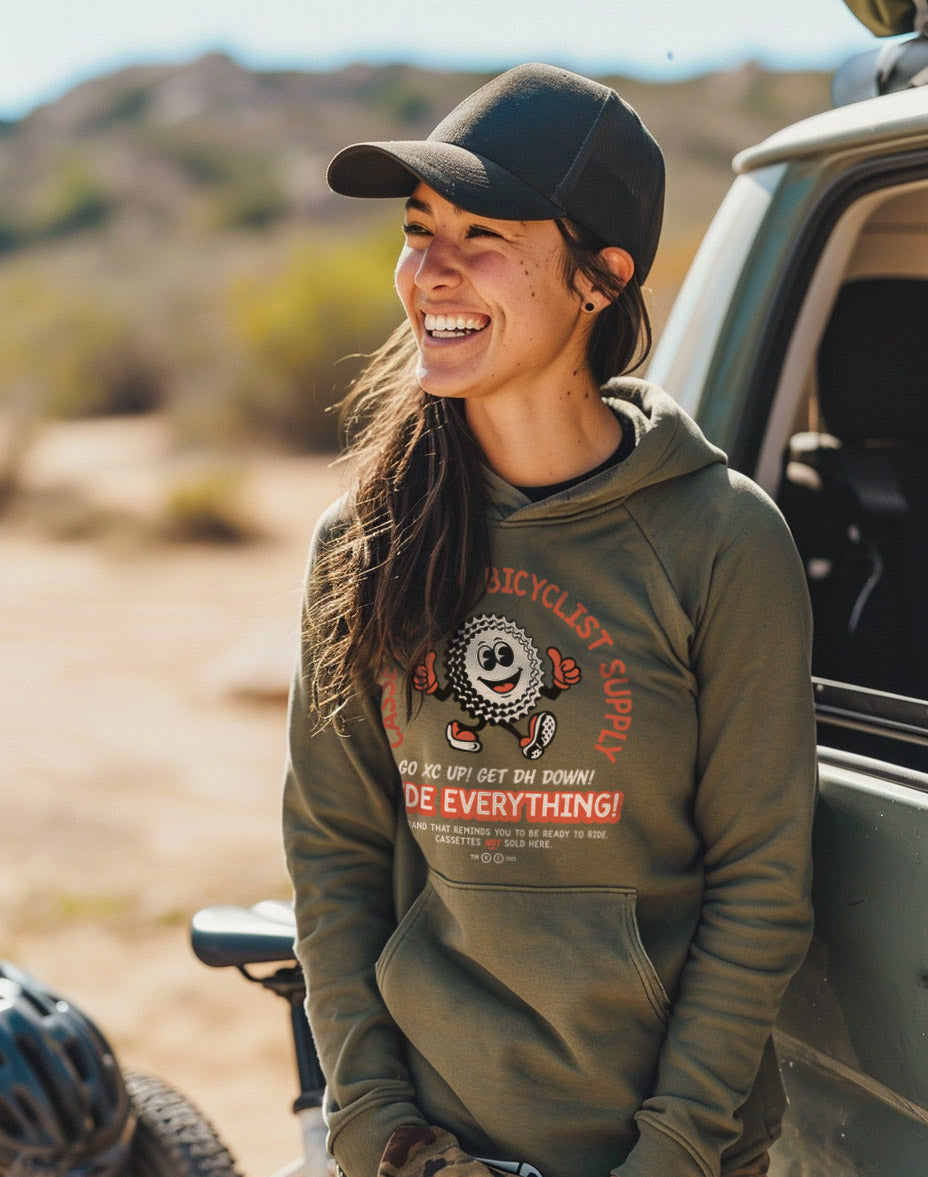 woman wearing the Jonny Cassette cycling hoodie in SoCal with mountain bike