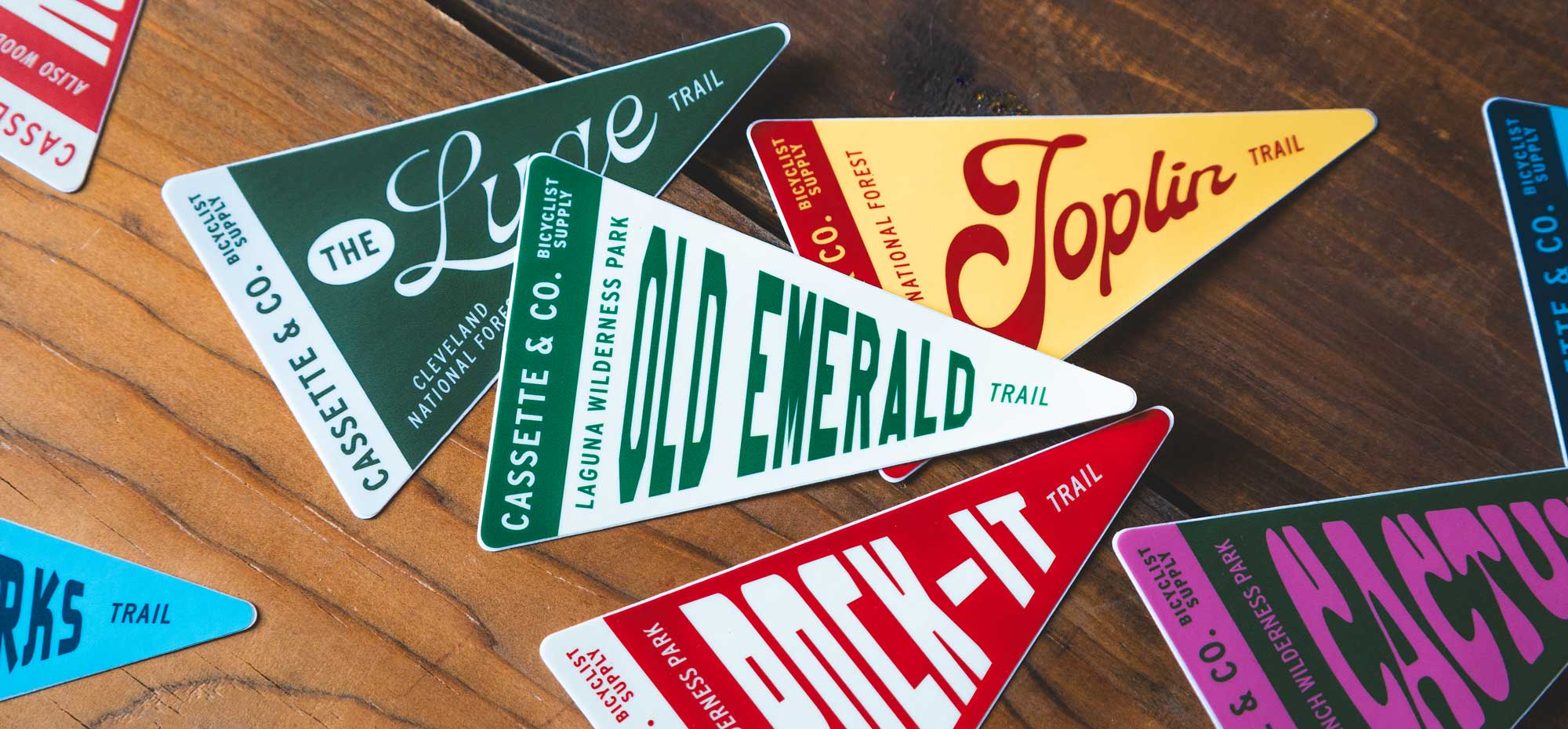colorful trail pennant stickers with Orange County trail names