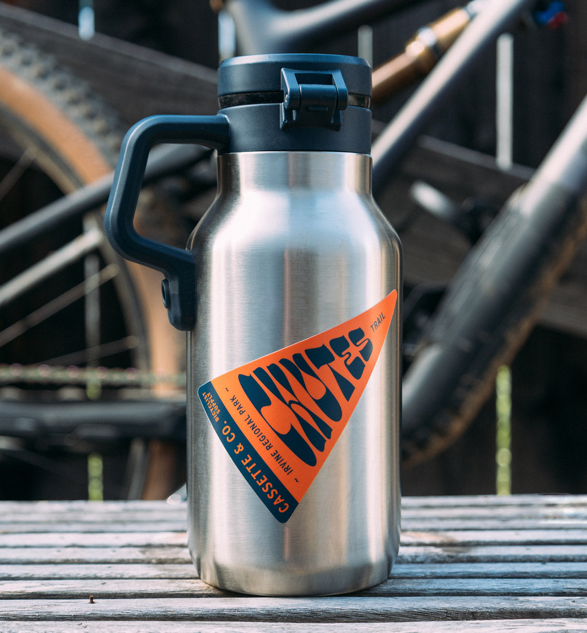 stainless thermos with Chutes trail sticker 