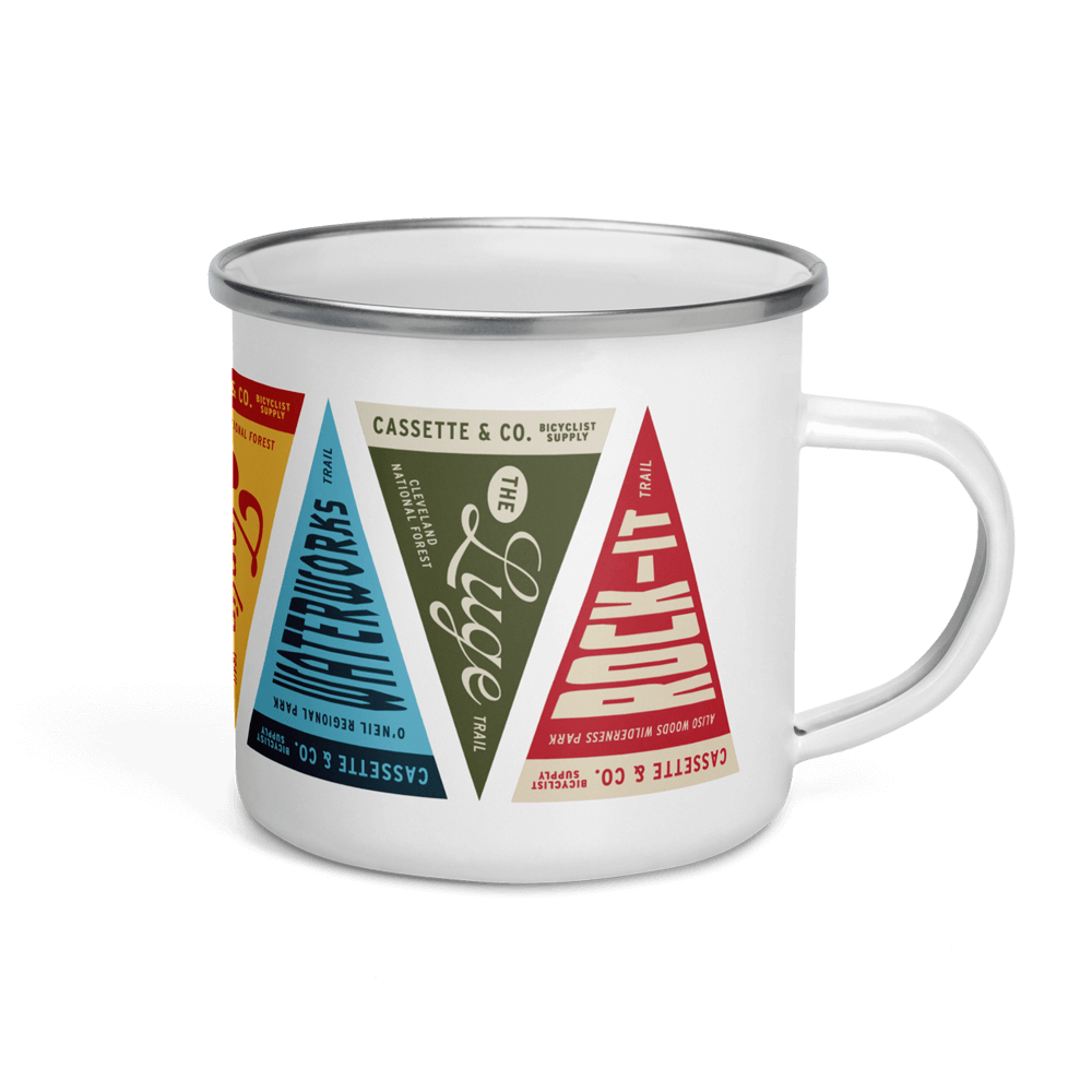 white cassette and company trail mug with full color print of trail pennants