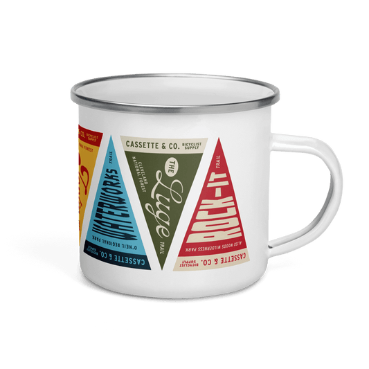 white cassette and company trail mug with full color print of trail pennants